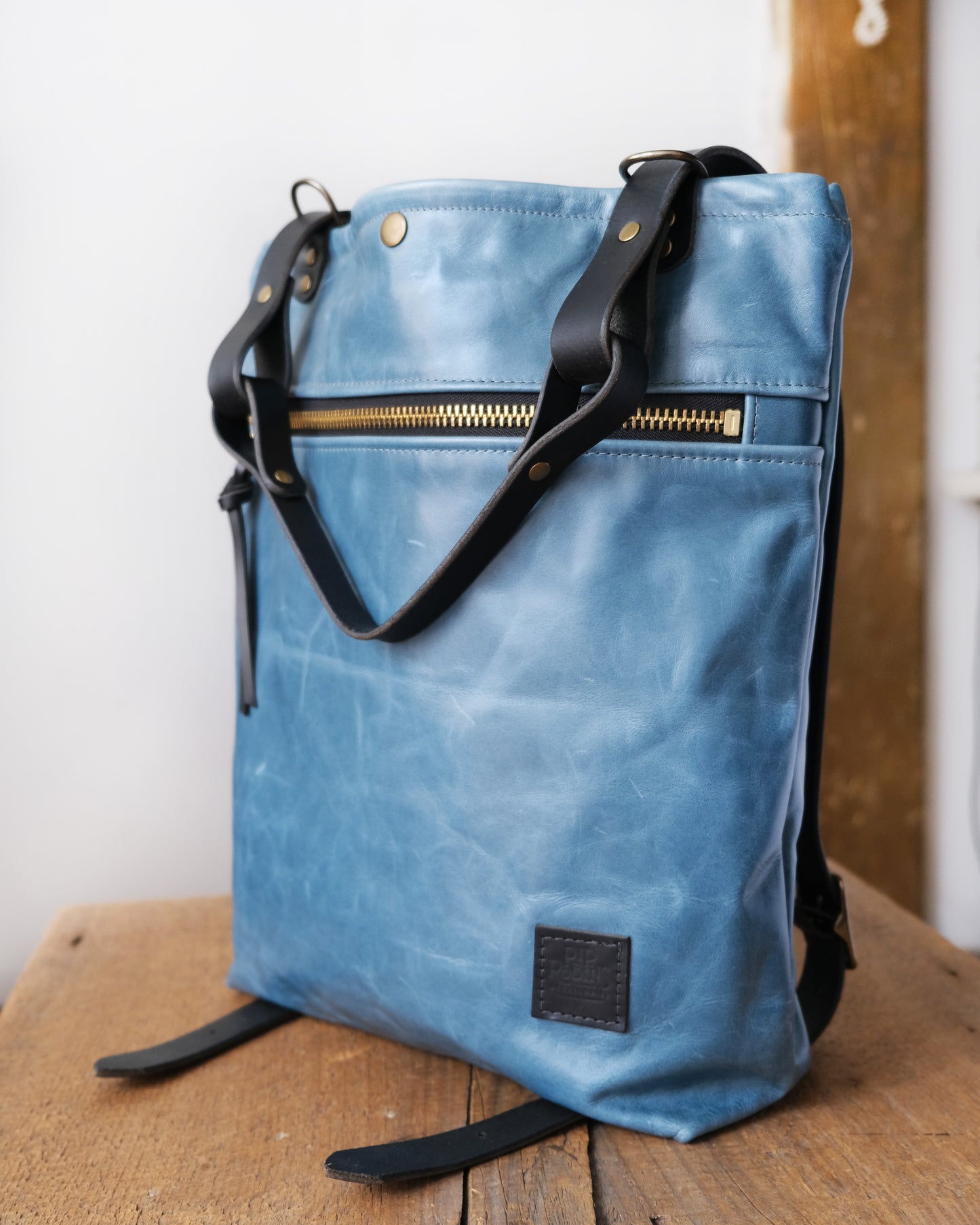 Zip-Top Convertible Backpack: Bright Blue Leather (Brass Hardware)