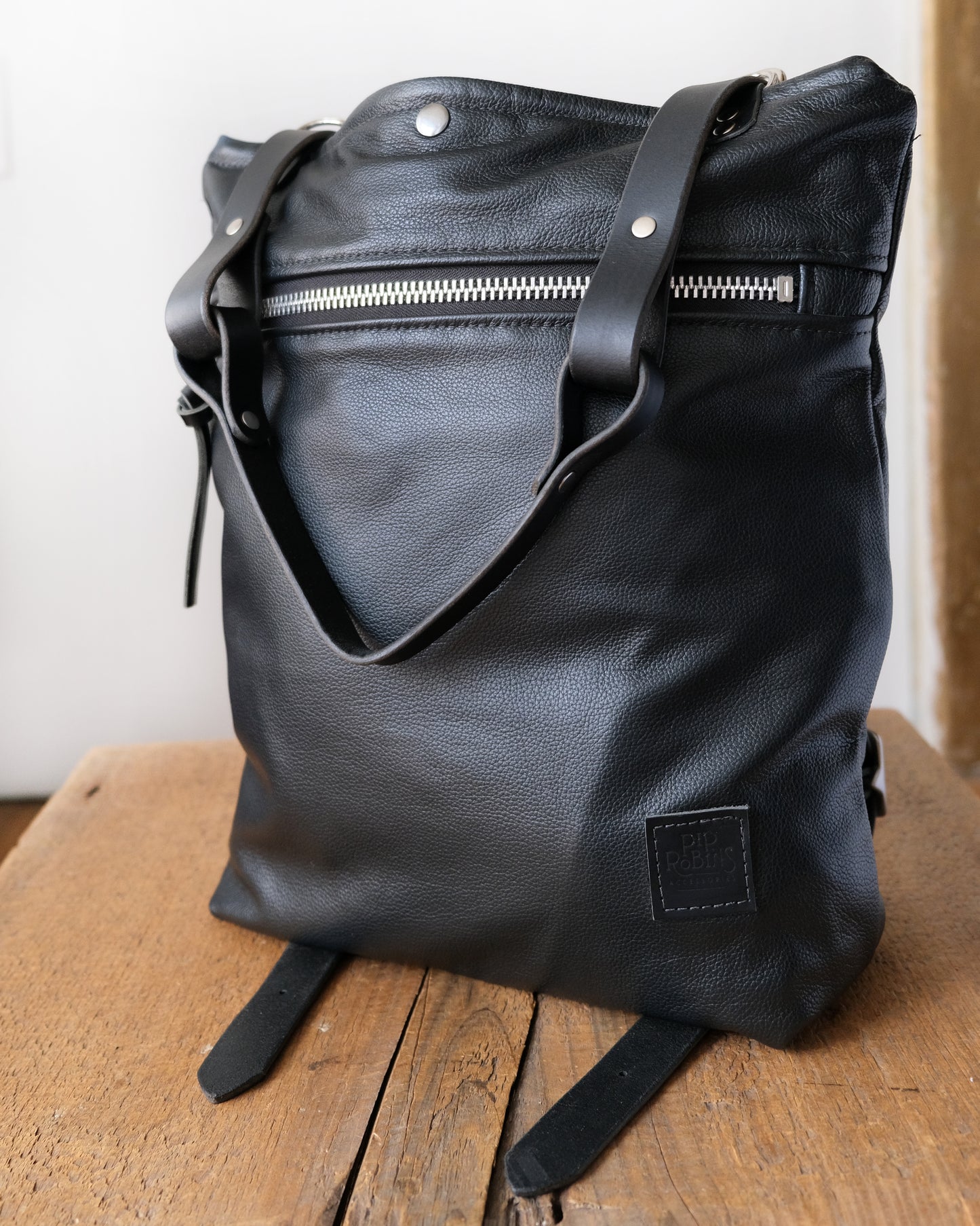 Zip-Top Convertible Backpack: Black Leather (Chrome Hardware)
