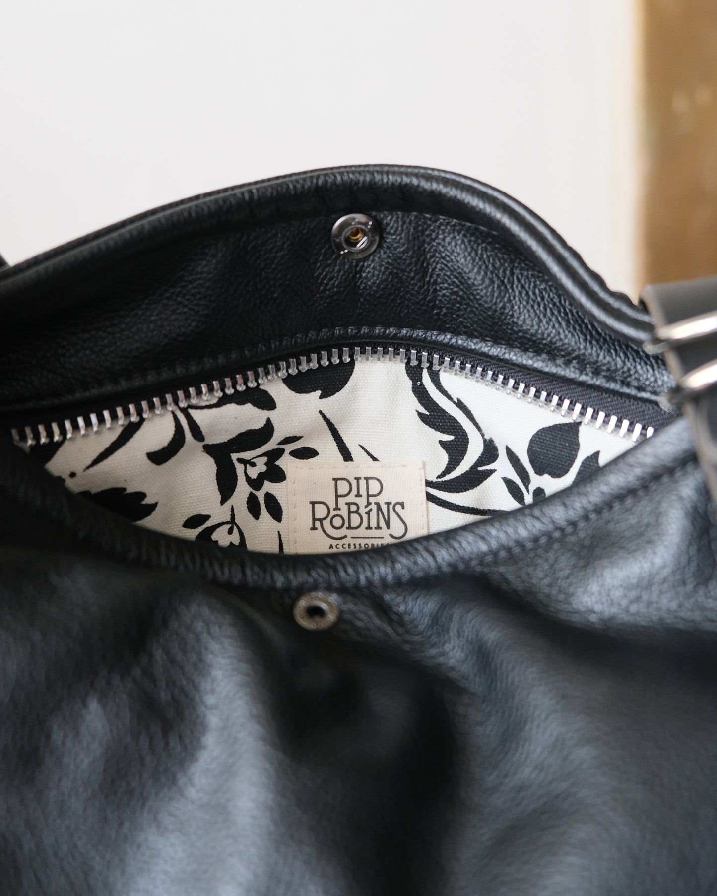 Zip-Top Convertible Backpack: Black Leather (Chrome Hardware)